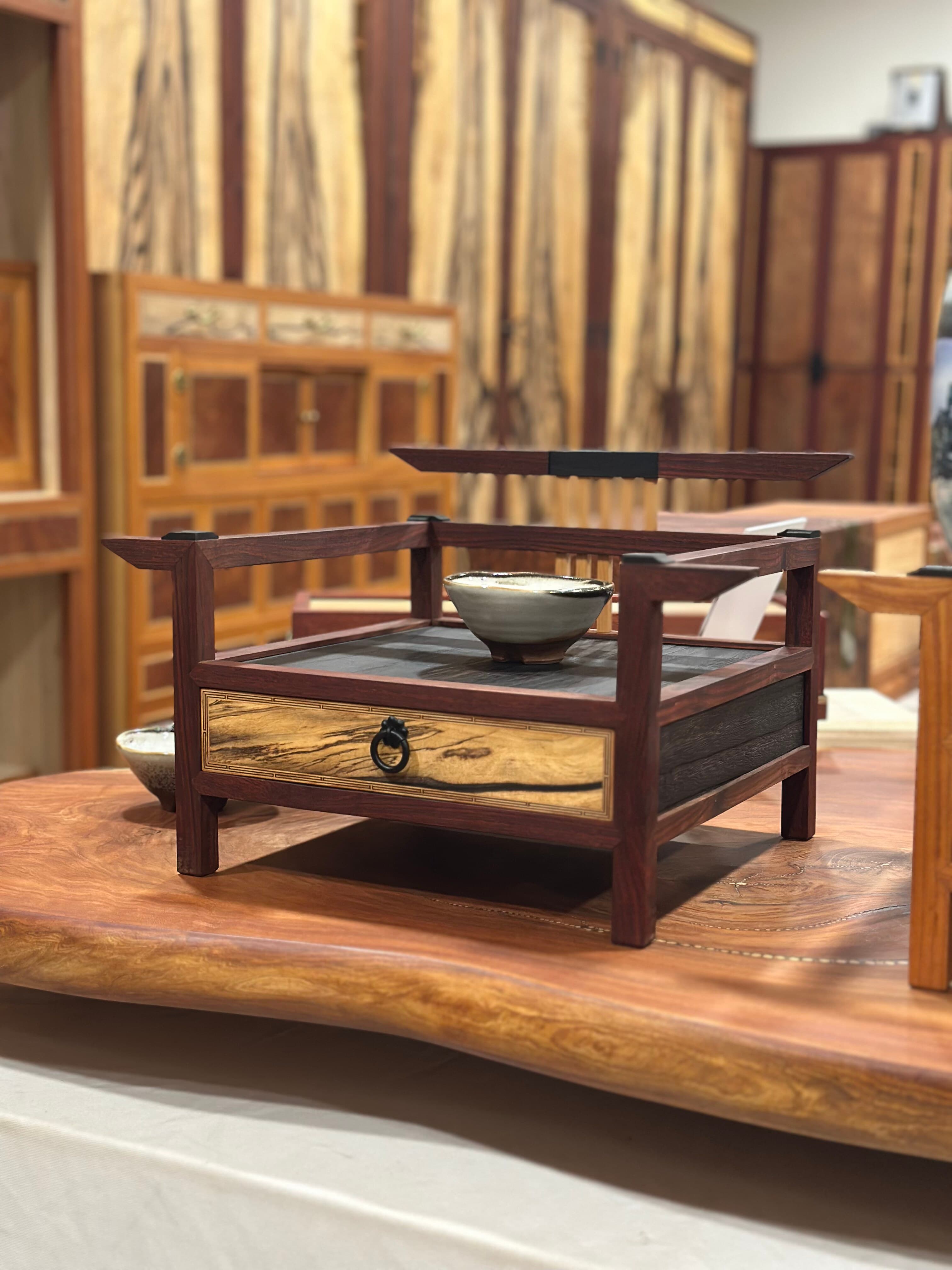 A contemporary wooden object rooted in traditional furniture